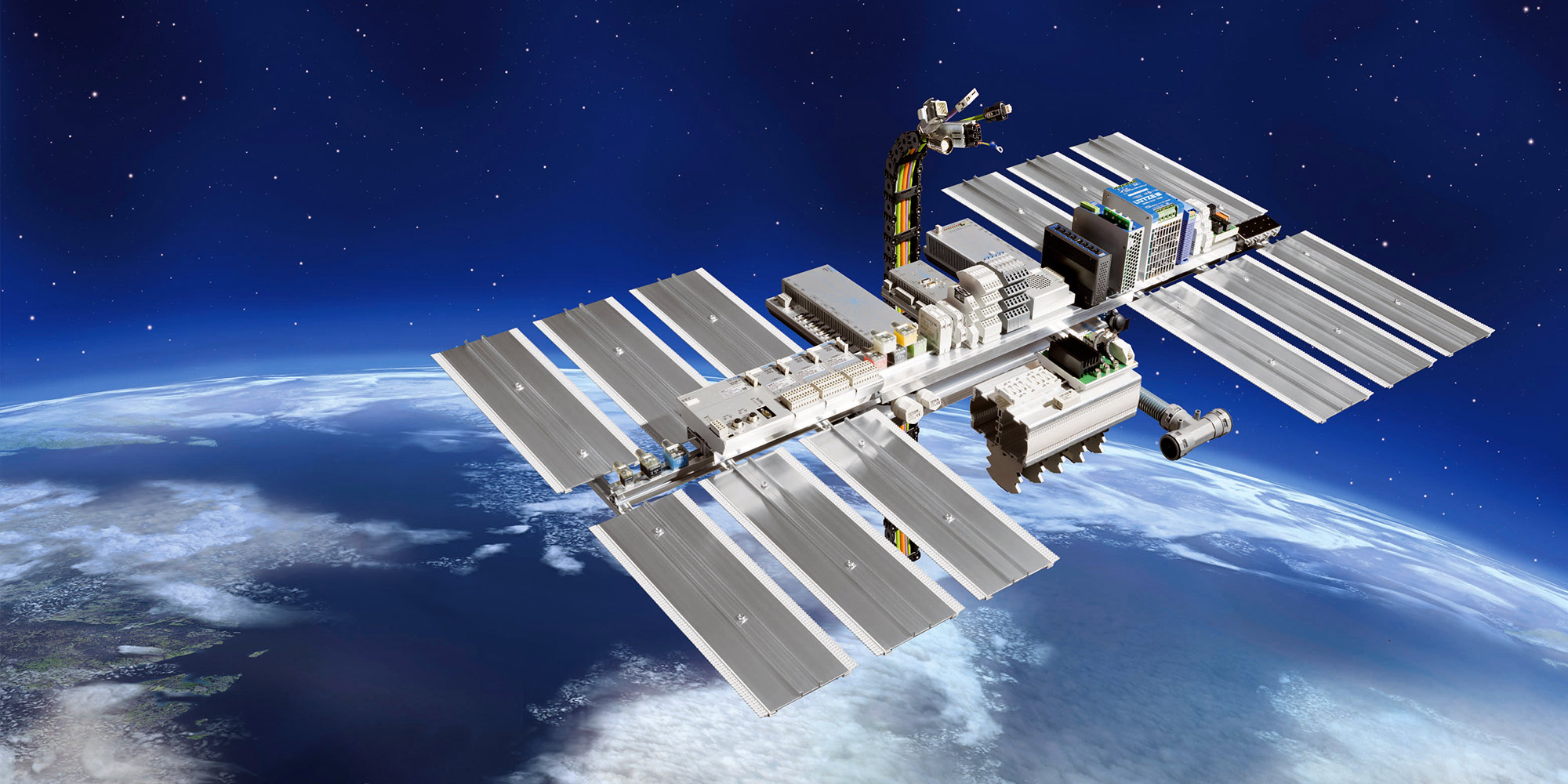 Kampagnen Fotografie Weinstadt Stuttgart und Umgebung LÜTZE ISS Messeplakat ISS Weltall Erdkugel